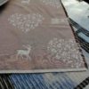 Tischdecke Hirsch mit Herzen creme auf beige
