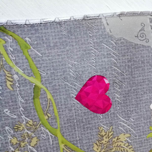 Grau mit pinken Blumen Mitteldecke Ziernaht