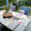 Tischset Blumenwiese für den Gartentisch aus beschichteter Baumwolle